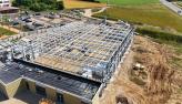 Structure acier grande portée bâtiment sportif